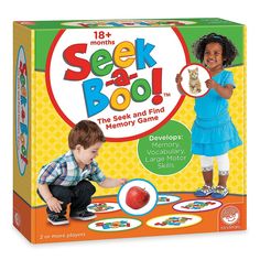 an image of a child playing with seek and boo board game in front of the box