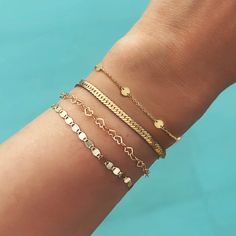 Petite 14K Gold round discs adorn this minimal bracelet. Delicate and subtle, it is perfect for everyday wear. 14K Solid Gold Length: 6in (15cm),6.5-7in (16.5-18cm) Disc diameter 3.8mm Lobster clasp closure Handcrafted in NYC Hypoallergenic, lead and nickel free #BS014 Minimalist Round Gold Bracelet Tarnish Resistant, Minimalist Tarnish Resistant Gold Bracelet, Minimalist Gold Bracelet With Delicate Chain, Minimalist Round Gold Bracelet For Everyday, Delicate Round Chain Bracelet For Everyday, Everyday Delicate Round Chain Bracelet, Minimalist Bracelet With Delicate Chain, Everyday Gold Bracelet With Delicate Chain, Everyday Minimalist Gold Bracelet