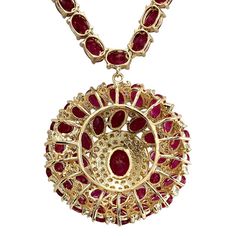 For Sale on 1stDibs - Stamped: 18K Yellow Gold Total Necklace Weight: 29.0 Grams Necklace Length: 17 Inches Necklace Width: N/A Gemstone Weight: Total Natural Center Ruby Weight Oval Jewelry With 17 Jewels For Evening, Dazzling Round Diamond Necklace With Jewels, Dazzling Round Diamond Necklace, Luxury Oval Necklace With Prong Setting, Formal Round Diamond Necklace With Gemstones, Luxury Oval Jeweled Necklaces, Polished Round Necklace For Evening, Round Necklaces With Polished Finish For Evening, Luxury Jeweled Oval Necklaces