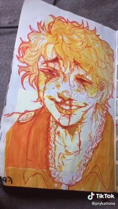 a drawing of a boy with blonde hair and orange shirt is sitting on a couch