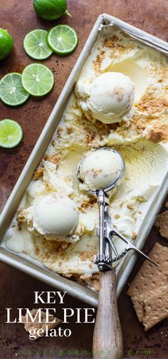 key lime pie ice cream in a pan with graham crackers and limes on the side