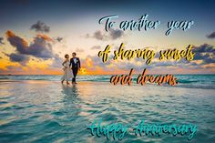 a couple standing in the ocean at sunset on their wedding day with words that read to another year if sharing secrets and dreams