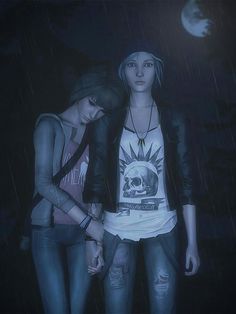 two young women standing in the rain at night