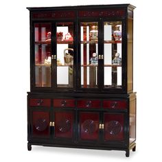 an antique china cabinet with glass doors and red wood trimmings on the front