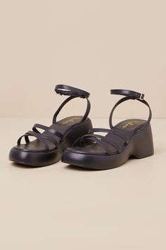 Whether you dress 'em up or dress 'em down, the Lulus Prescott Black Strappy Platform Ankle Strap Sandals are ready to hit the streets! Smooth faux leather shapes these must-have sandals with an almond-shaped footbed, crisscrossing toe straps, and a slender vamp strap (all atop a 1"" toe platform). Matching straps sprout from the sides to host a slender ankle strap with an adjustable silver buckle. A chunky block heel completes the look! Available in whole sizes only. 3" platform heel. Lightly c 90s Platform Sandals, Sandals 2020 Trends, Edgy Sandals, Types Of Sandals, Strap Sandals Heels, Travel Fits, Pretty Sandals, Black Platform Sandals, Black Strappy Sandals