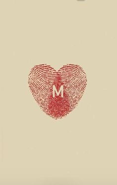 a fingerprint heart with the letter m in it's center on a beige background