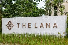 the sign for the entrance to the building that houses the company's headquarters and office