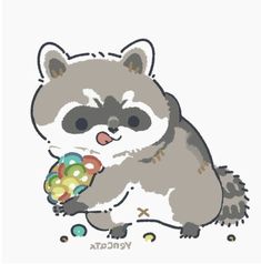 a raccoon holding a candy ball in its paws