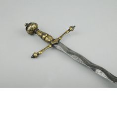 Sword, Probably Italy, possibly Milan, c. 1550 - c. 1560, Iron or steel, gold and silver, counterfeit-damascened and russeted, Length: 87.7 cm, blade, Width: 2.7 cm, blade, at guard, Weight: 0.72 kg, Length: 100.7 cm, Width: 18.5 cm, guard, Balance point: 13.8 cm, forward of the guard block Pretty Teeth, Rings Inspiration, Black Smithing, Sharp Teeth, Gold Silk