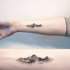 two pictures of mountains on one arm and the other hand with a mountain tattoo on it