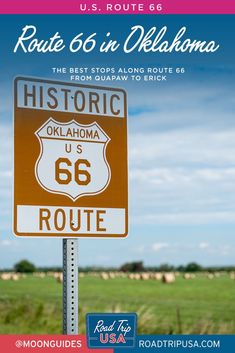 a road sign with the words route 66 in front of a green field and blue sky