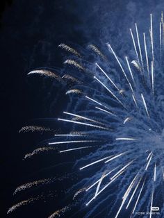 fireworks are lit up in the night sky