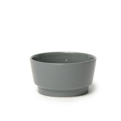 a gray bowl sitting on top of a white table