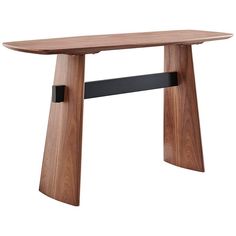 a wooden table with black metal legs and an oval shaped design on the top, against a white background