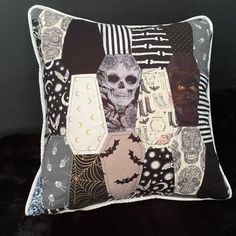 a decorative pillow with an image of a skeleton on it