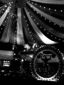 the ceiling is decorated with lights and draping