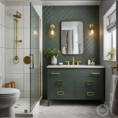 a bathroom with green walls and gold accents on the vanity, toilet and shower stall