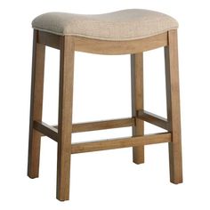 a wooden stool with a beige upholstered seat and foot rest on an isolated white background