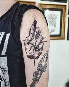 Striking Blackwork Arm Tattoo of Hand Holding a Star - Signifying Hope and Ambition Tattoo Of A Hand, Star Tattoos On Shoulder, Tattoos On Shoulder For Women, Hand Holding Tattoo, Ambition Tattoo, Star Tattoo On Shoulder, Best Star Tattoos, Tattoos On Shoulder, Woodcut Tattoo