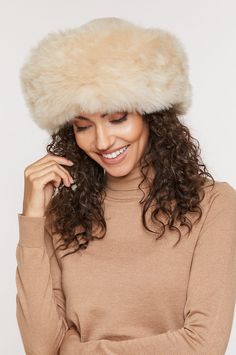 Our majestic winter Cossack hat crowns you in fur. It's made by hand of baby alpaca fur that's so thick, soft, and luxurious that you'll never be in a rush to take it off. This hat keeps you protected from wind and cold, and always well dressed for any occasion. Genuine Baby Alpaca Fur. 23" circumference. Polyester Lining. Cossack Hat, Cherub Baby, Alpaca Hat, Dior Hat, Russian Hat, Chanel Hat, Louis Vuitton Hat, Black Bucket Hat, Cowl Neck Sweater Dress