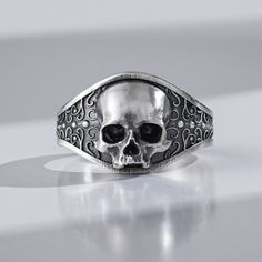 The jawless skull is an elegant, yet frighteningly beautiful design that gives this ring a sense of strength and power. It is truly a one of a kind piece that will be sure to get heads turning at every place you go. With this ring, you can turn heads anywhere and everywhere you go, whether you want to or not! This ring would be the perfect gift for any biker, punk rocker, goth or hippie in your life. Get your hands on this gorgeous silver gothic skull ring and show off your gothic side. It's als Goth Rings, Goth Ring, Birthday Gifts For Brother, Skull Rings, Gothic Ring, Presents For Best Friends, Presents For Boyfriend, Biker Rings, Gifts For Fiance