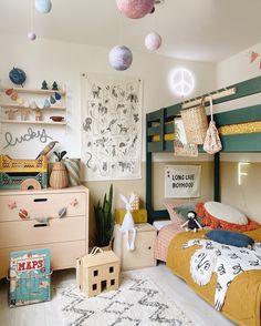 a child's bedroom with bunk beds and toys