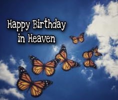 a group of butterflies flying in the sky with words happy birthday in heaven on it