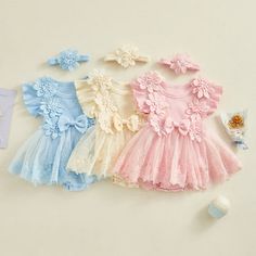 Pretty and feminine-this girly romper dress is great for warm days. Perfect for holidays, weddings, photo shoots, and more. Pretty and delicate eyelet pattern top with tie flutter sleeves and fluffy tulle shirt.  Snap bottom closure. Available in sizes 12M-5T, two colors. Good things take time.  This gorgeous romper sh Summer Lace Tutu Dress For Dress-up, Cute Summer Dress With Lace Patchwork, Spring Cute Bubble Romper With Ruffle Sleeves, Sweet Fitted Bubble Romper For Spring, Easter Dresses With Ruffles And Short Sleeves, Spring Bubble Romper With Ruffles And Flutter Sleeves, Spring Bubble Romper With Ruffles, Cute Short Sleeve Bubble Romper For Spring, White Flutter Sleeve Bubble Romper For Spring