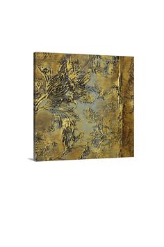 an abstract painting on canvas with gold and blue colors, in the shape of flowers