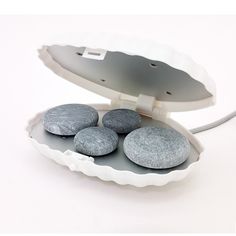 A Royal Massage exclusive! Our portable clamshell hot stone heat plate provides up to 10 stone capacity, rapid heating times, “cool outer wall touch” technology and compact convenience to provide a truly holistic hot stone experience. This heater is perfect for heating stones for massage, manicures, pedicures and facials or when smaller volumes are needed. 120V (50W) High quality heater designed specifically for heating massage stones Suitable for up to 10 small stones or 4 large stones Cool Touch outer Clam Shell for improved handling No water needed. Double steel heating elements provide quick, instantaneous heat Heats rocks to 122 degrees Fahrenheit (50 degrees Celsius) Lightweight and portable makes it easy to heat stones in about 10 minutes Outside dimensions are 8.25" x 5.7" x 3" BON Hot Rocks, Cream Pumps, Romantic Gifts For Him, Massage Stones, Massage Equipment, Hot Stone Massage, Professional Massage, Stone Massage, Hot Stones