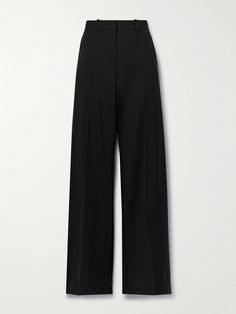 The careful precision and craftsmanship that goes into creating Valentino Garavani's tailoring makes each piece remarkably exceptional. These pants are made in Italy from smooth yet lightweight wool-blend crepe and fall to long straight legs with pressed creases. Tuck a silky blouse into the high-rise waist. Valentino Pants Women, Black Strait Leg Pants, Black Slick Pants, Black Taylored Pants, Elegant Luxury Tight Pants, Luxury Stretch Bottoms With Pleated Waist, Straight Leg Pants With Flats, Formal Black Flare Pants, Tailored Straight Pants