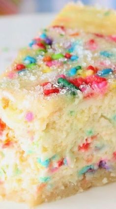 a piece of cake with sprinkles on it