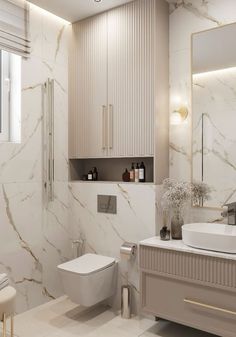 a white bathroom with marble walls and flooring