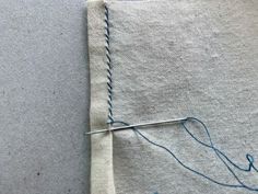 a close up of a piece of cloth with thread