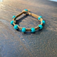 This macrame bracelet was handmade by me using brown hemp cord and aqua wooden beads. Hemp Braiding, Hemp Macrame, Hemp Bracelet, Hemp Bracelets, Hemp Cord, Macrame Bracelet, Beads Handmade, Macrame Jewelry, Macrame Bracelets