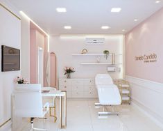 the interior of a nail salon with white chairs and pink walls, gold trimmings