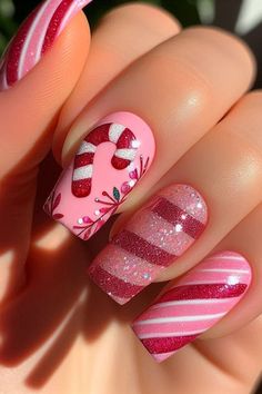 I’m thrilled about the pink Christmas nail trend! The designs are so unique and festive. What do you think of this idea? Share your thoughts in the comments below about this beautiful pink Christmas nail design! Pink Red And Green Christmas Nails, Christmas Nails Acrylic Squoval, Christmas Nails Pink And Red, Candy Cane Nails Pink, Cute Christmas Nails Square, Cute Holiday Nails Winter, Christmas Nail Designs Acrylic Short, Christmas Nail Color Ideas, Christmas Nail Simple