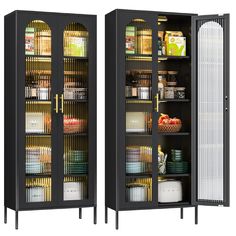 two tall black cabinets with glass doors and shelves filled with food, drinks and condiments