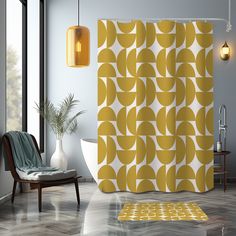 a bathroom with a yellow shower curtain next to a chair and potted plant on the floor