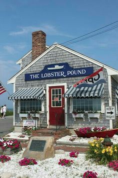 the lobster pound has been decorated with flowers and flags