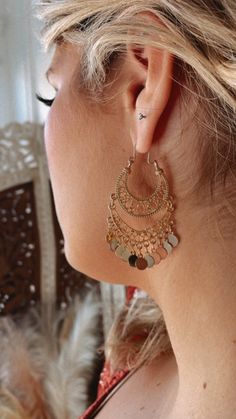 Elevate your boho style with these ethnic filigree hoops. Gold intricacy features coil dangles in a fusion of cultural allure and elegance. Gold coin hoops earrings Gold ethnic hoop earrings Measures: 2 3/8 x 1 1/4" Gold Coin Earrings, Hoops Earrings Gold, Bride Top, Hoops Gold, Coin Earrings, Exclusive Dress, Everyday Chic, Hoops Earrings, Gold Coin