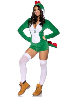 a woman in a green costume is posing for the camera with her hands on her hips