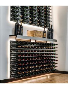 a wine rack with many bottles on it