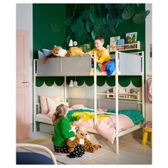 two children sitting on bunk beds in a room with green walls and pink carpeting