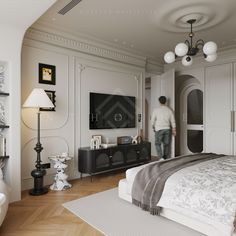 a man is standing in the middle of a bedroom with white walls and wood floors