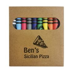 a cardboard box filled with colorful crayons next to a piece of paper that says ben's sicilian pizza