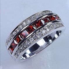 925 Ss Classic Ruby Res & White Cz Band Ring Metal: 925 Sterling Silver Color Stones Ruby Red Cz Color Stones: White Cz Stone Size 3mm Pretty Wedding Rings, Mens Rings For Sale, Garnet Wedding, Red Garnet Ring, Cocktail Jewelry, Silver Wedding Bands, Gem Ring, Silver Wedding Rings, Band Jewelry