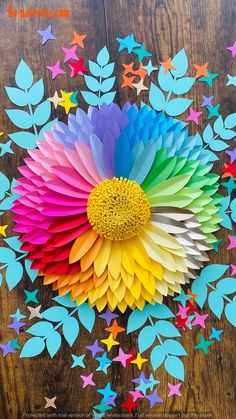 a colorful paper flower surrounded by stars