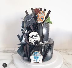 a star wars themed cake on a marble table