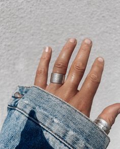 A chunky antique silver plated statement ring in an adjustable design. Simple and unadorned in style, the ring has a matte finish which gives it an understated, vintage appeal.  ▪️Adjustable design  ▪️Approx UK size O - Q (US size 7.5 - 8.5) ▪️Antique silver plated brass ▪️The ring will be presented in attractive Scraffs packaging Care Instructions: ▪️Silver plate will last for years if looked after correctly ▪️Store in the protective gift bag to prevent tarnishing ▪️Keep away from water/sweat e Adjustable Wide Band Ring For Everyday, Handmade Silver Wide Band Ring Minimalist Style, Handmade Minimalist Silver Wide Band Ring, Handmade Silver Minimalist Wide Band Ring, Handmade Wide Band Open Ring, Handmade Open Wide Band Ring For Everyday, Trendy Silver Wide Band Open Ring, Trendy Silver Open Wide Band Ring, Everyday Silver Wide Band Ring